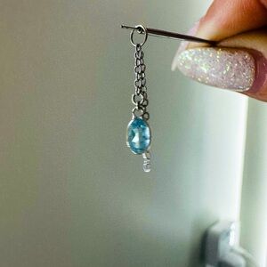 14k white gold and London blue topaz dangle by Hialeah Fine Jewelry